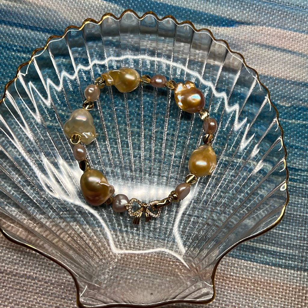 M201 Luxe - Flame Ball Freshwater Mini Flame Gold Champagne Pearl Bracelet 150$